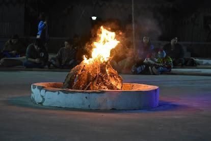 Bonfire evening under the stars at desert camp Jaisalmer