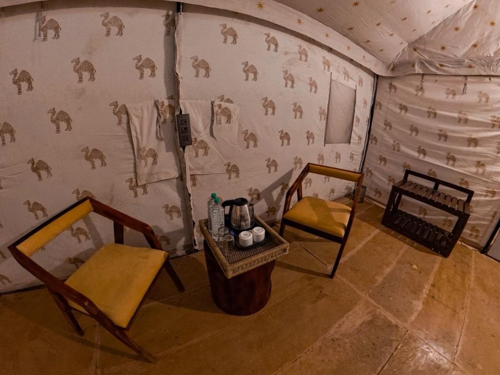 Seating area inside luxury tent